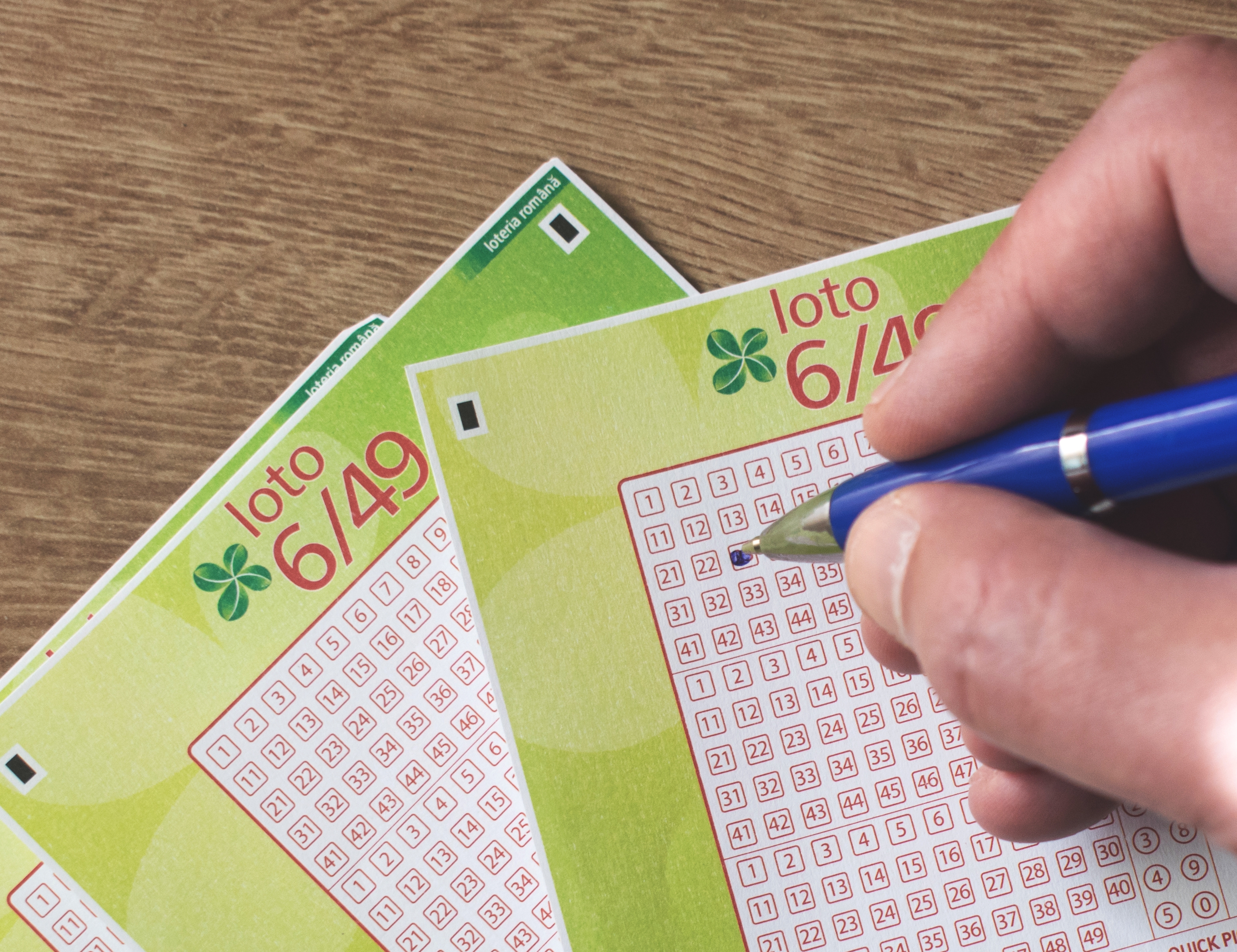 Playing,Games,Of,Chance,,Lotto-concept.,Completing,A,Lottery,Ticket.romania,,Bucuresti.