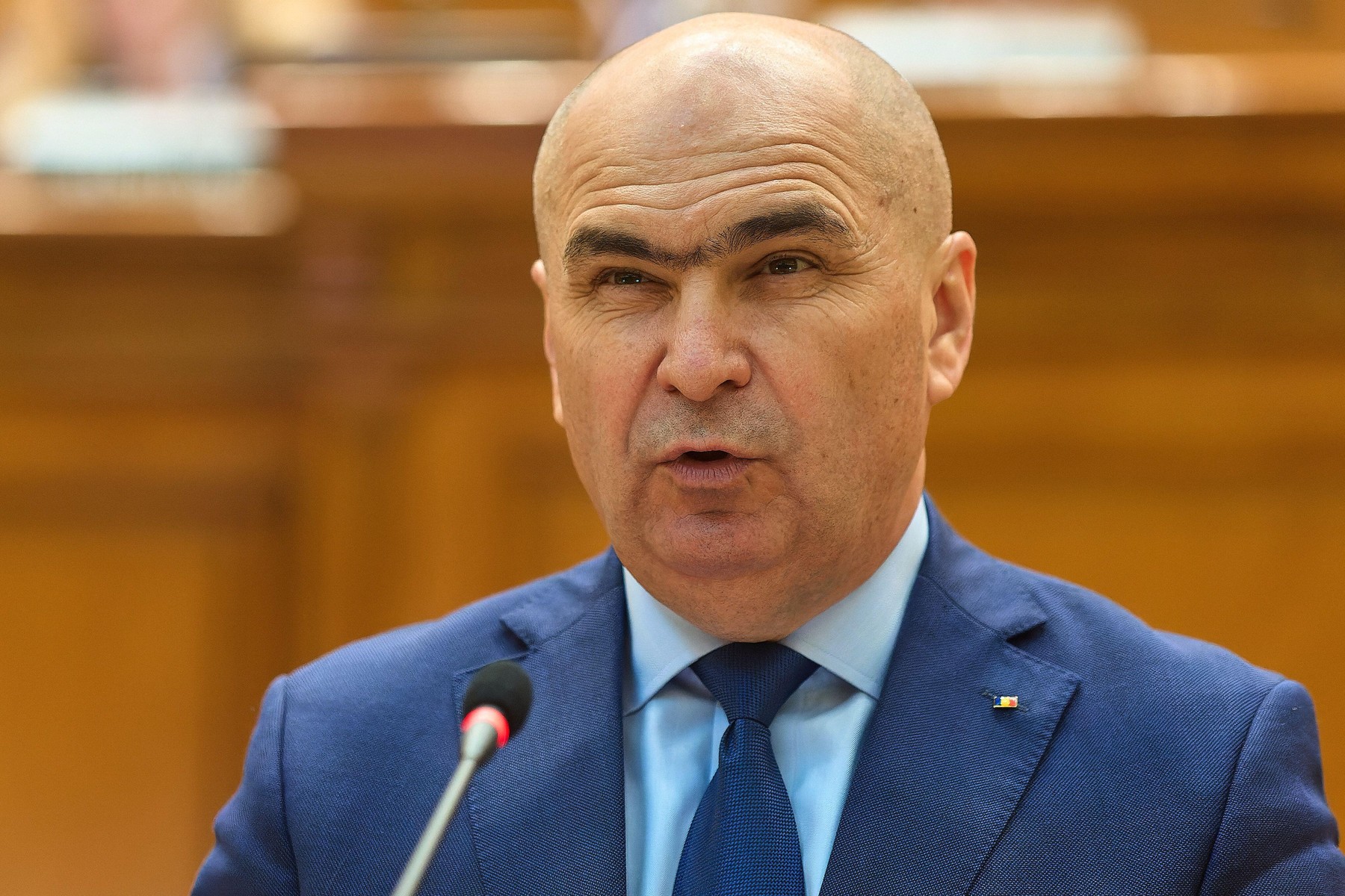 Bucharest, Romania. 7 Sep 2025: Ilie Bolojan, Prime Minister of Romania, gives his speech during the debate on the four motions of no confidence filed by the Alliance for the Union of Romanians (AUR) in response to the government&apos;s decision to assume resp