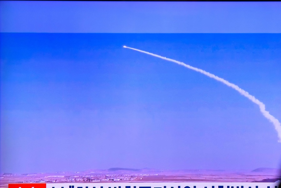A 24-hour Yonhap news TV broadcast at Seoul Railway Station showing a news broadcast with a test-fire of the latest surface-to-air missile(SAM) to examine its comprehensive performance at an undisclosed location in North Korea. North Korea has successfull